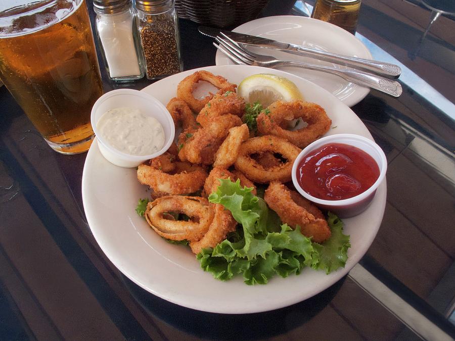 Fried, Battered Squid Rings With Dips And Beer Photograph by William Boch