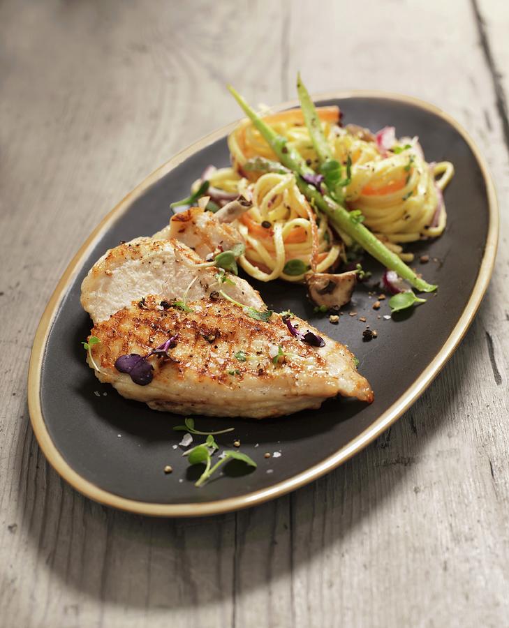 Fried Chicken Breast With Noodle Salad Photograph by Martin Dyrlv