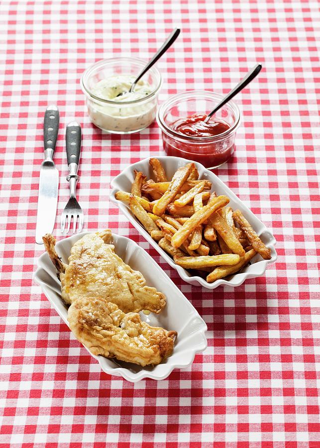 Fried Chicken With Chips, Ketchup And Remoulade On A Checked Tablecloth Photograph by Julia Hildebrand