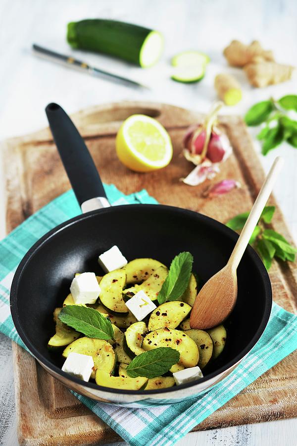 Fried Courgette With Feta Cheese And Peppermint Photograph by Mariola Streim