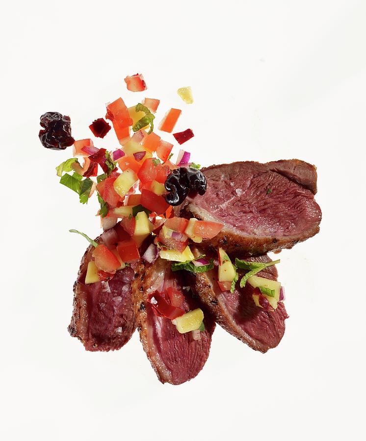 Fried Duck With An Chilli And Mango Salsa Photograph by Clinton Hussey