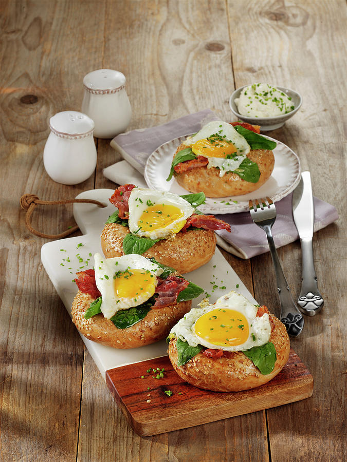 Fried Egg And Bacon Bagels Photograph by Stockfood Studios / Photoart