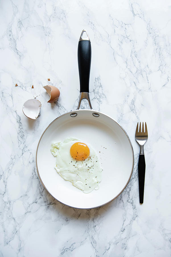 Fried Egg In A Frying Pan, View From Above Photograph by Magdalena Hendey