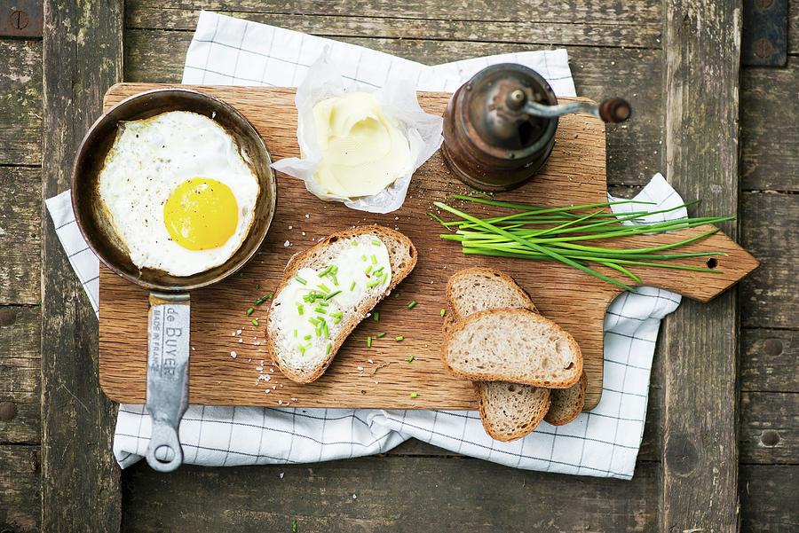 Fried Egg With Chive Bread Photograph by Fotografie-lucie-eisenmann