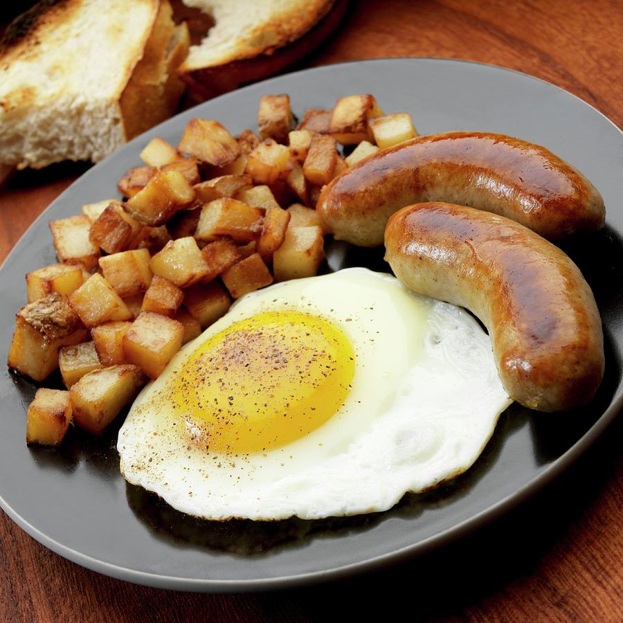 Fried Egg With Two Bangers Photograph by Paul Poplis