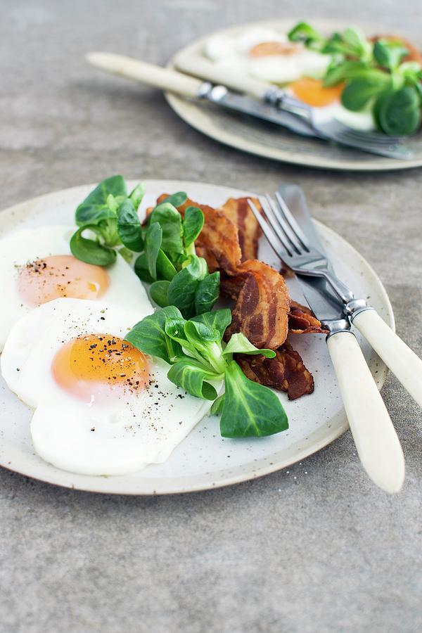 Fried Eggs And Bacon Photograph by Justina Ramanauskiene