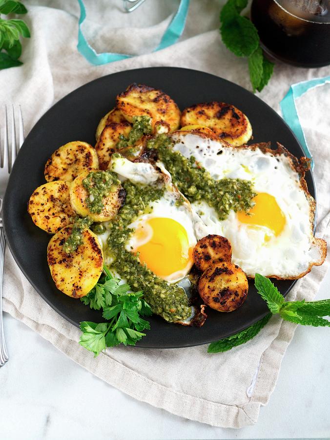 Fried Eggs With Plantain And Chimichurri Sauce For Breakfast Photograph by Christine Siracusa