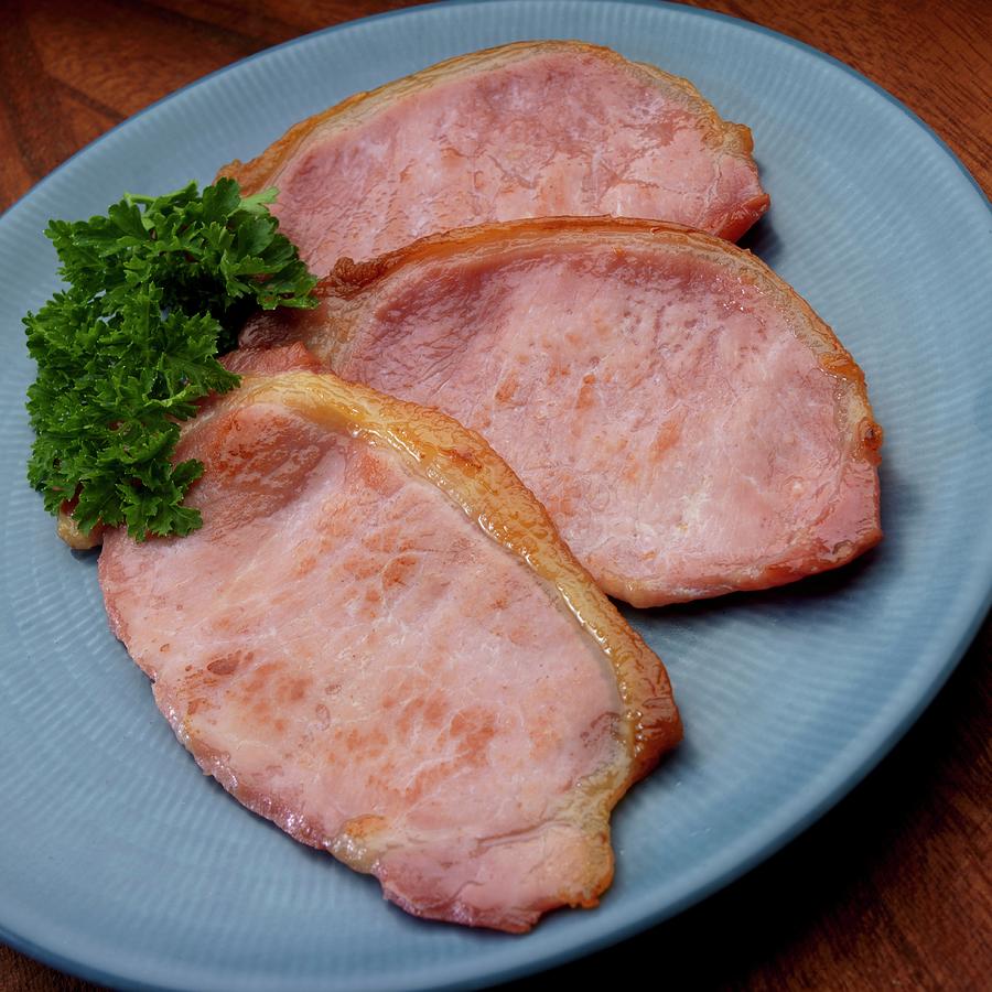 Fried English Style Bacon On Plate Photograph by Paul Poplis