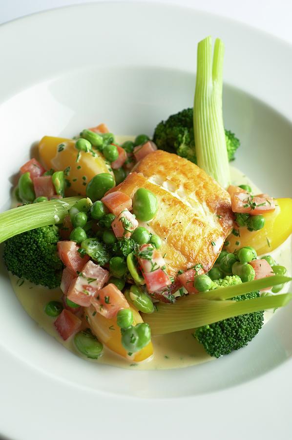 Fried Halibut Fillet With Bacon, Broccoli, Peas And Potatoes Photograph by Tim Green