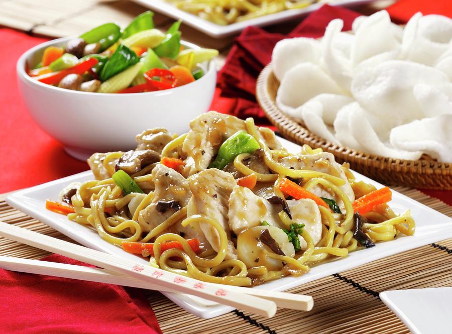 Fried Noodles With Chicken, Vegetable Salad And Prawn Crackers china Photograph by Stuart Macgregor