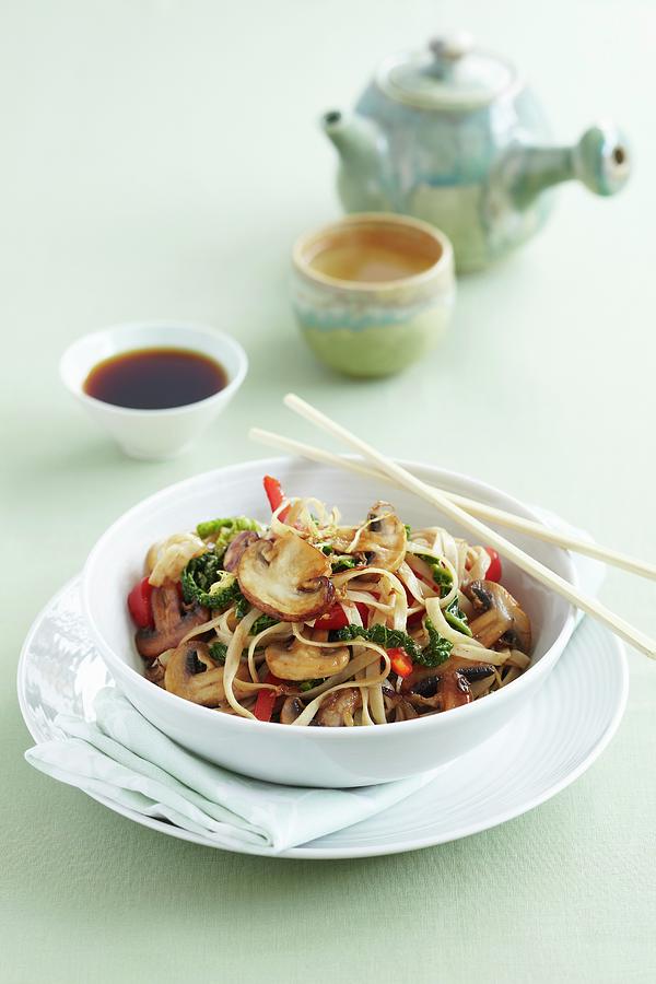 Fried Noodles With Chinese Cabbage, Mushrooms And A Cup Of Tea china Photograph by Charlotte Tolhurst