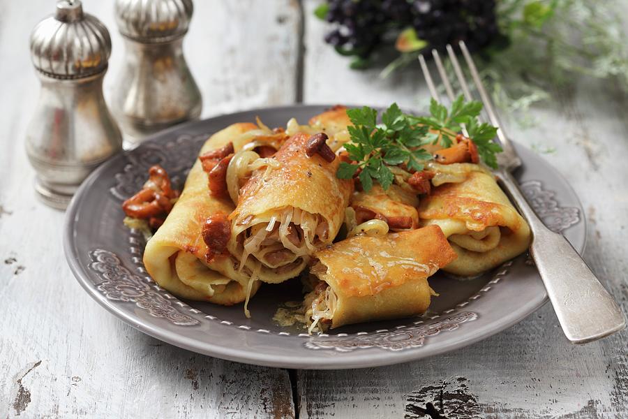 Fried Pancake Rolls Filled With Sauerkraut And Mushrooms Photograph by Boguslaw Bialy