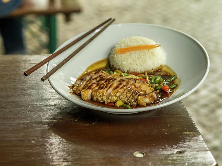Fried Pork Belly With A Side Of Rice Photograph by Manuel Krug