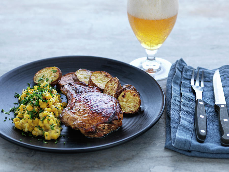 Fried Pork Chop With Corn And Fried Potatoes Photograph by Martin Dyrlv