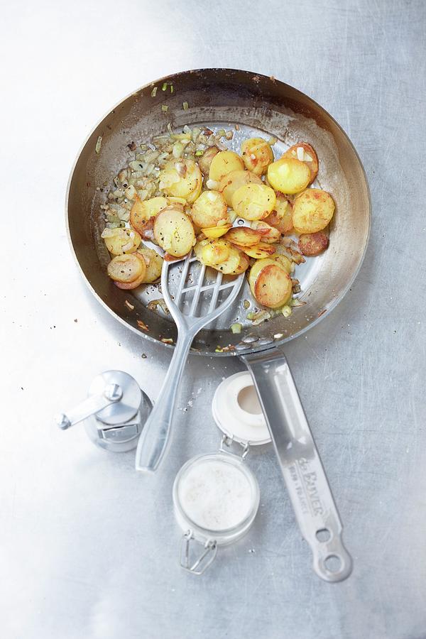 Fried Potato In A Pan Photograph by Jalag / Wolfgang Schardt