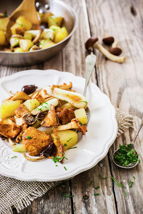 Fried Potatoes With Mushrooms And Spring Onions Photograph by Maricruz Avalos Flores
