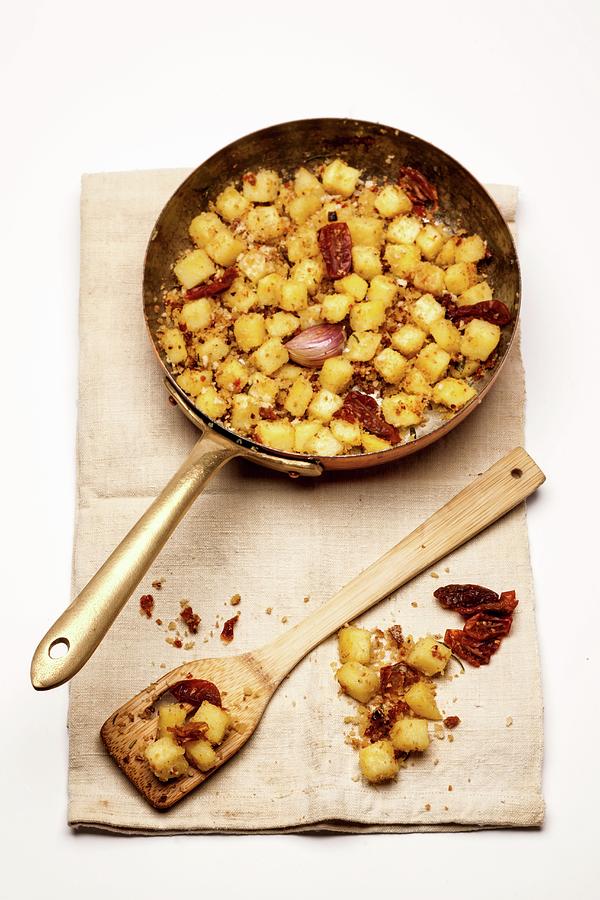 Fried Potatoes With Onions Photograph by Paolo Della Corte