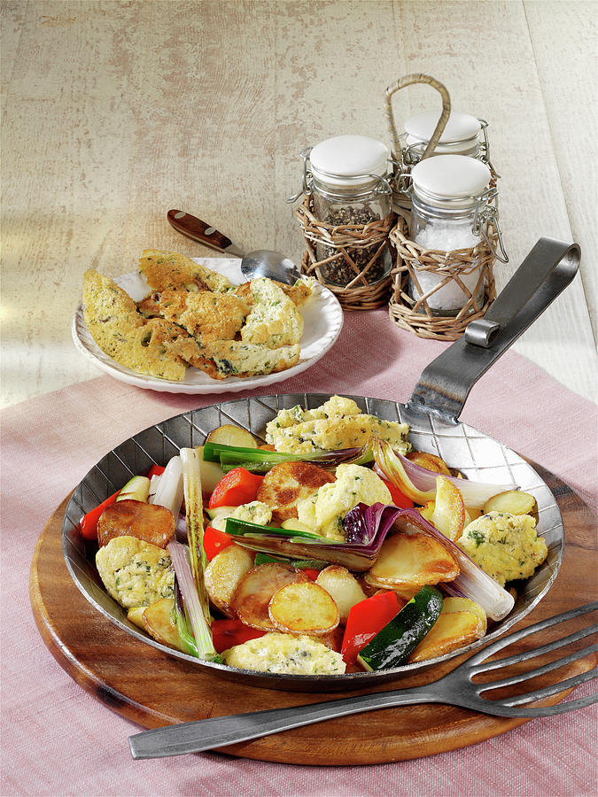 Fried Potatoes With Pancakes, Mediterranean Vegetables And Cheese Photograph by Stockfood Studios / Photoart