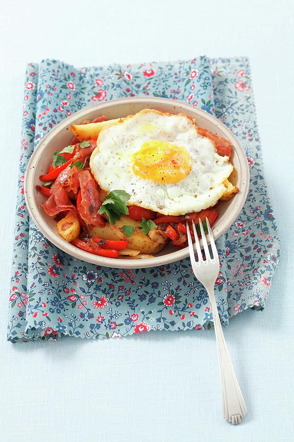 Fried Potatoes With Peppers, Bacon And A Fried Egg Photograph by Rua Castilho