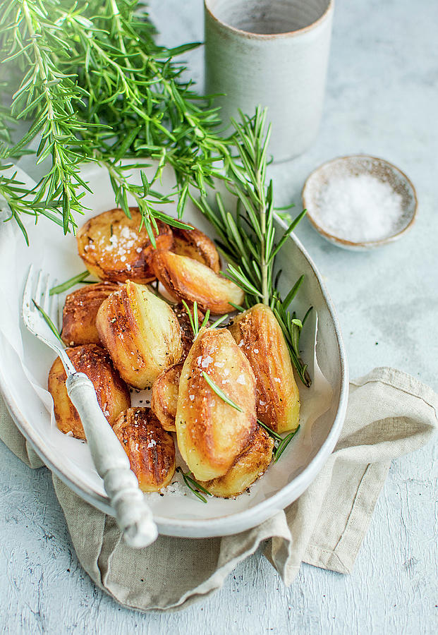 Fried Potatoes With Rosemary And Salt Photograph by Olimpia Davies