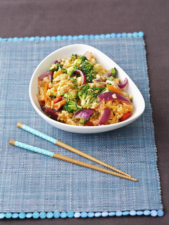 Fried Rice With Chicken, Peppers, Broccoli And Red Onions In A Sweet And Sour Sauce asia Photograph by Rua Castilho