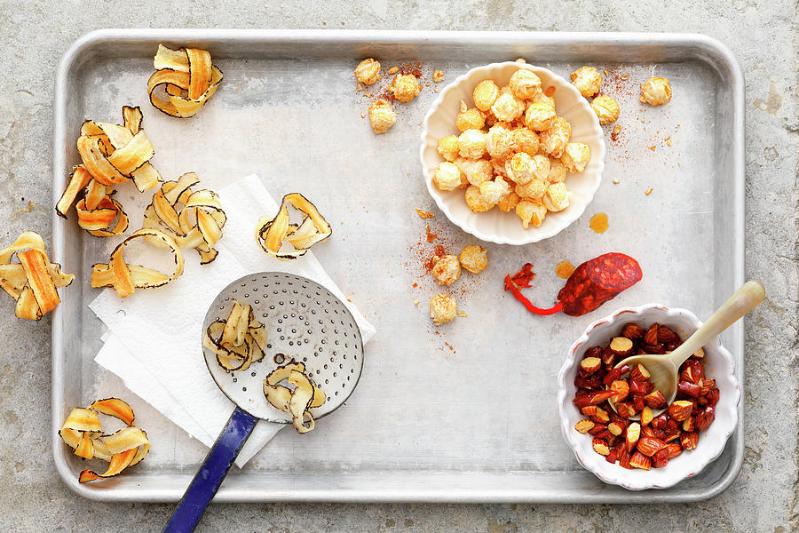 Fried Salsify, Seasoned Popcorn, Chorizo And Almonds As Toppings Photograph by Mathias Neubauer / Stockfood Studios