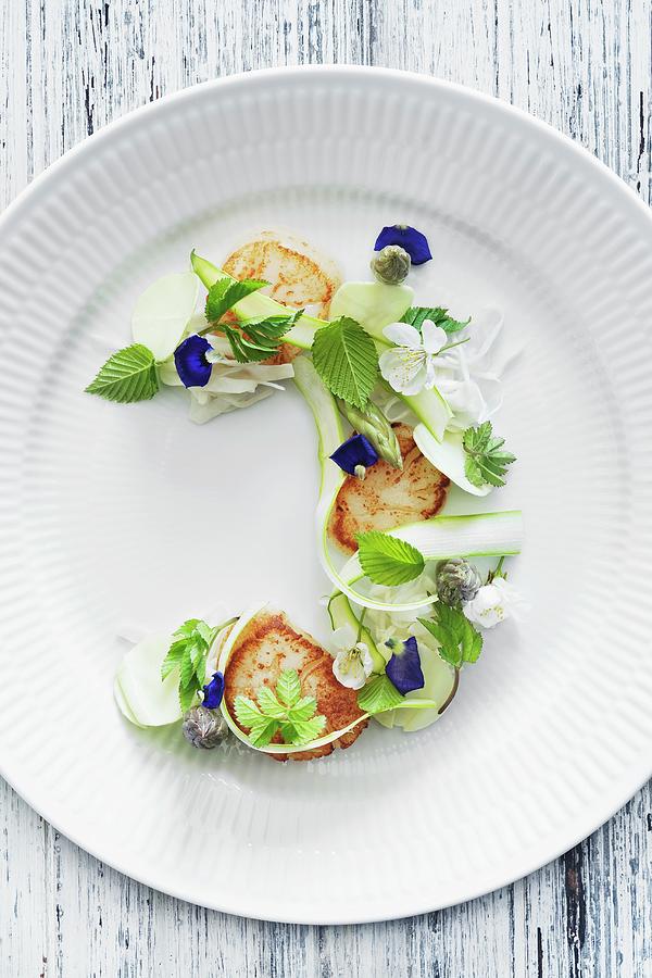 Fried Scallops, Green Asparagus, Summer Cabbage And Beech Leaves. Photograph by Ulf Svane