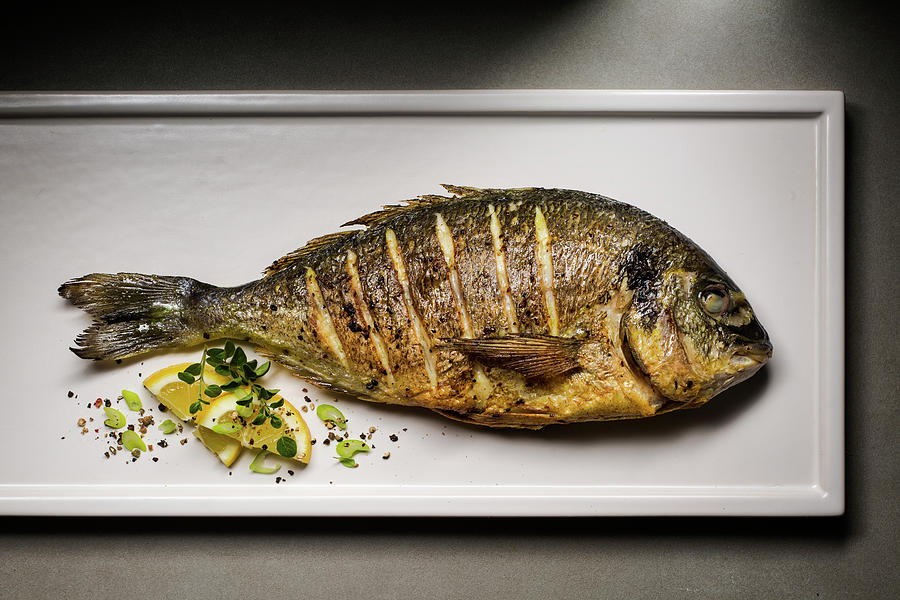 Fried Sea Bream Photograph by Manfred Jahrei