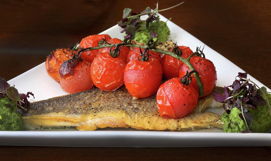 Fried Seabass With Roasted Vine Tomatoes Photograph by Steven Morris