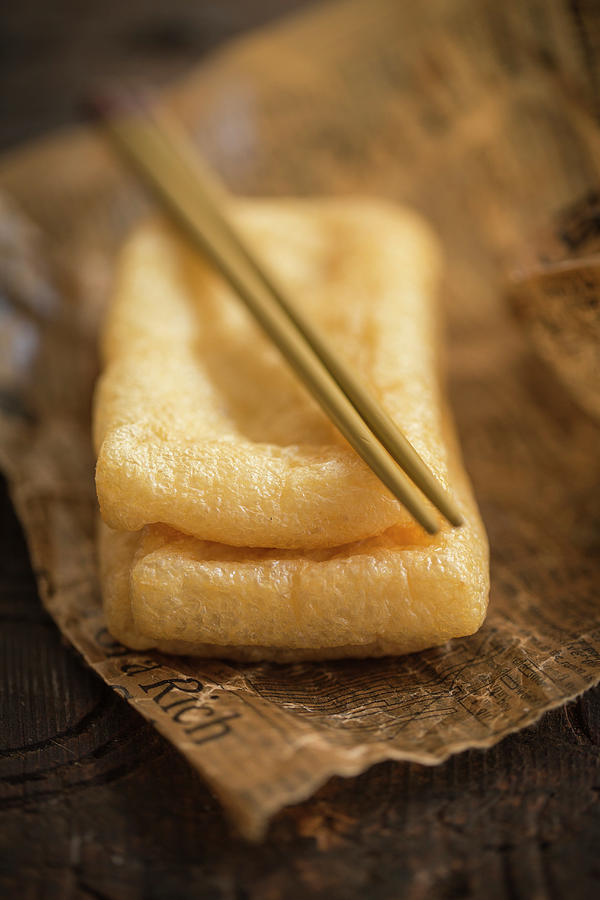 Fried Tofu With Chopsticks On Paper asia Photograph by Eising Studio