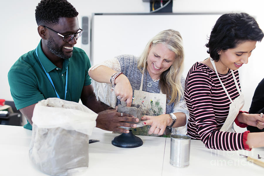 Adult Education Photograph - Friends Enjoying Pottery Art Class by Caia Image/science Photo Library Adult Education Photograph - Friends Enjoying Pottery Art Class by Caia Image/science Photo Library