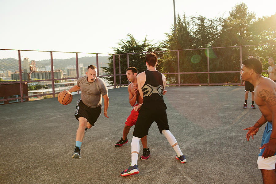 Friends Playing Basketball In Court Photograph by Cavan Images - Fine ...