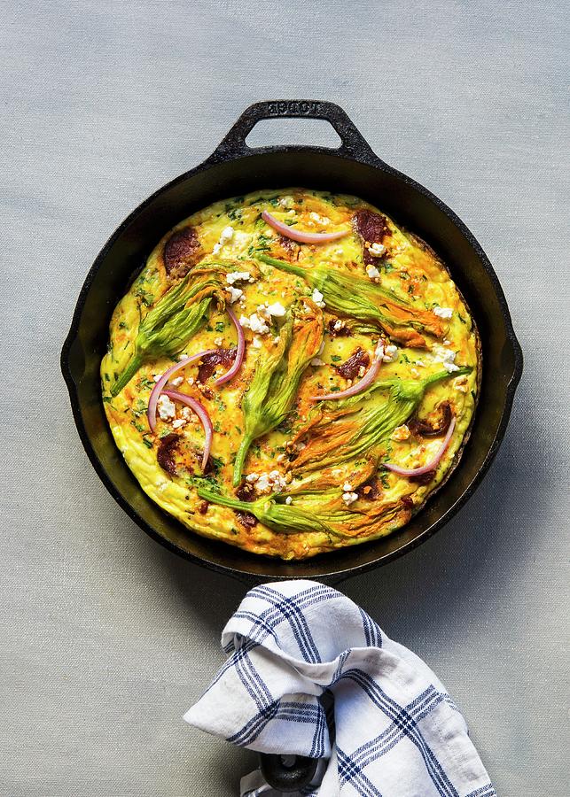 Frittata With Courgette Flowers, Chorizo And Cream Cheese Photograph by Lisa Rees