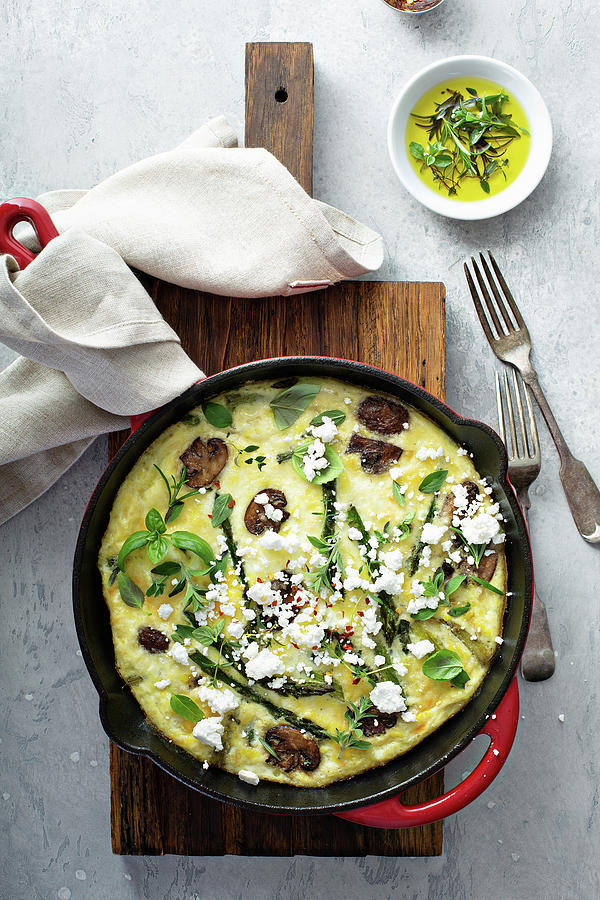 Frittata With Green Asparagus, Mushrooms And Goats Cheese Photograph by Elena Veselova