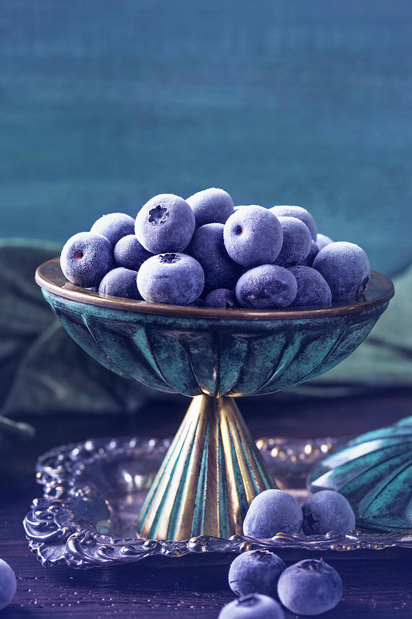 Frozen Blueberries In A Vintage Bowl Photograph by Elena Schweitzer