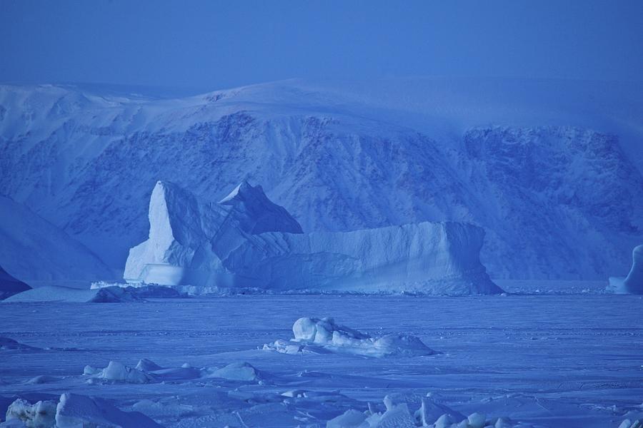 Frozen Iceberg In The Ocean At Qaanaaq, Northwest Greenland, Greenland Photograph by Jrg Reuther