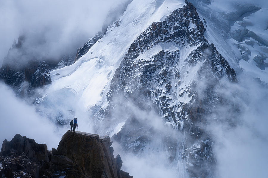 Frozen Peaks And Brave Souls Photograph by Jie Xiao