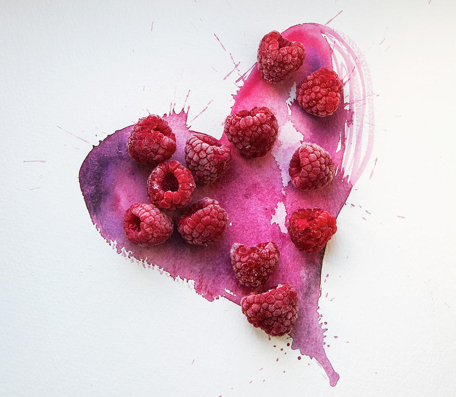 Frozen Raspberries On A Hand Painted Pink Watercolour Heart Photograph by Stacy Grant