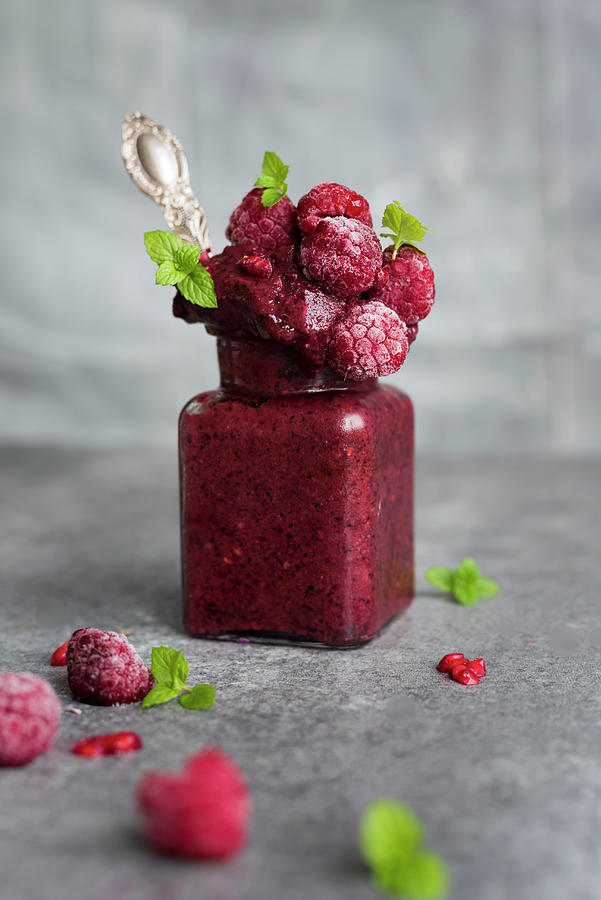 Frozen Smoothie Sorbet With Raspberries, Cashew Milk And Acai Photograph by Healthylauracom