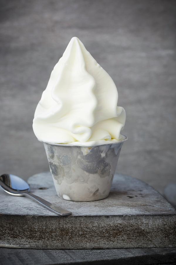Frozen Yoghurt In A Metal Cup Photograph by Esther Hildebrandt