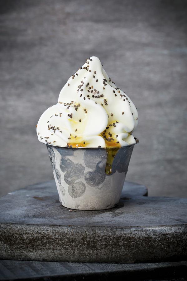 Frozen Yoghurt In A Metal Cup With Chia Seeds And Honey Photograph by Esther Hildebrandt