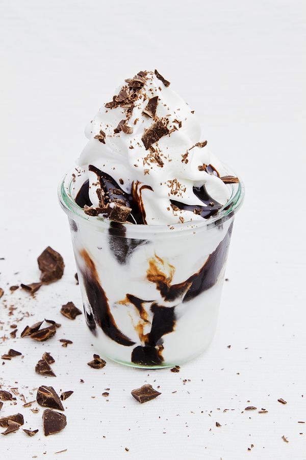 Frozen Yogurt With Chocolate Sauce And Grated Chocolate Photograph by ...