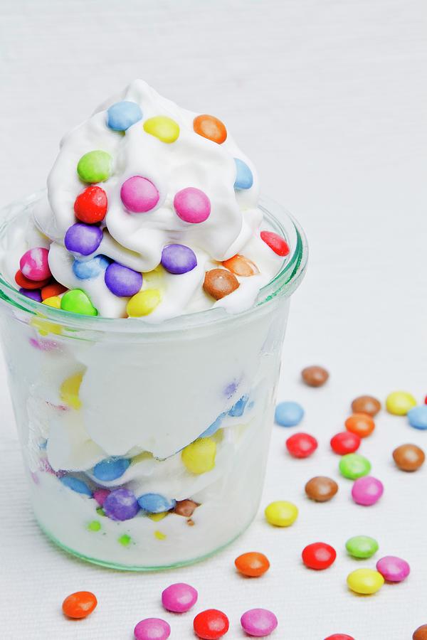 Frozen Yogurt With Colourful Chocolate Beans Photograph by Esther Hildebrandt