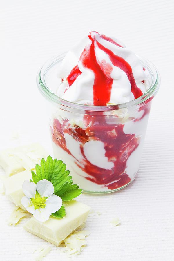 Frozen Yogurt With Strawberry Sauce, White Chocolate And A Strawberry Flower Photograph by Esther Hildebrandt