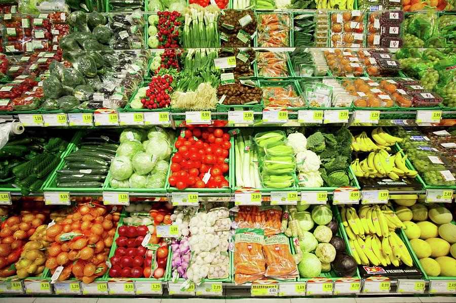 Fruit And Vegetable Display In A Supermarket Photograph by Rita Newman
