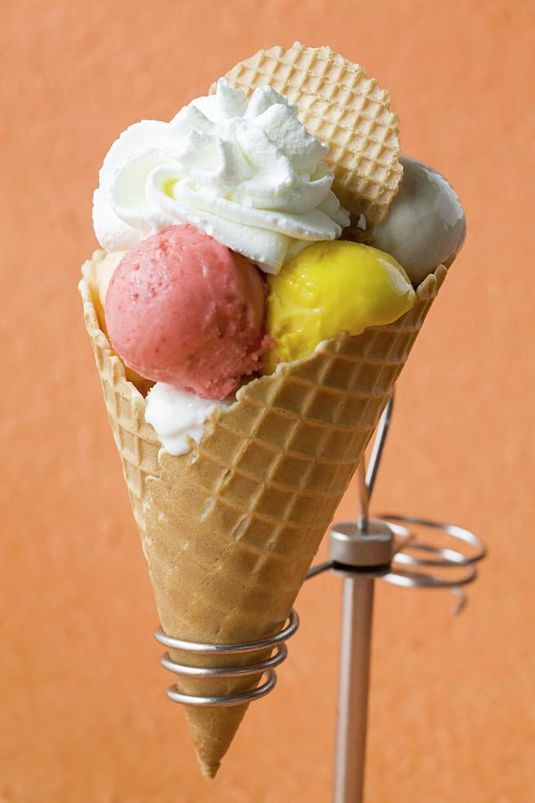 Fruit Ice Cream With Cream In A Wafer Cone Photograph by Blueberrystudio