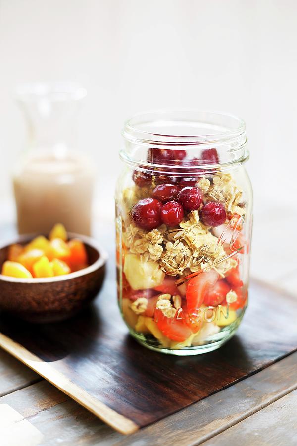 Fruit Muesli, Dried Apricots And Almond Milk Photograph by Elle Brooks