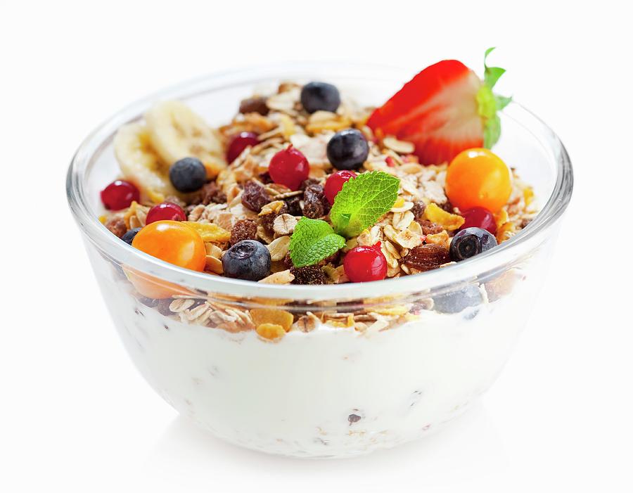 Fruit Muesli With Yoghurt In A Glass Bowl Photograph by Foodografix