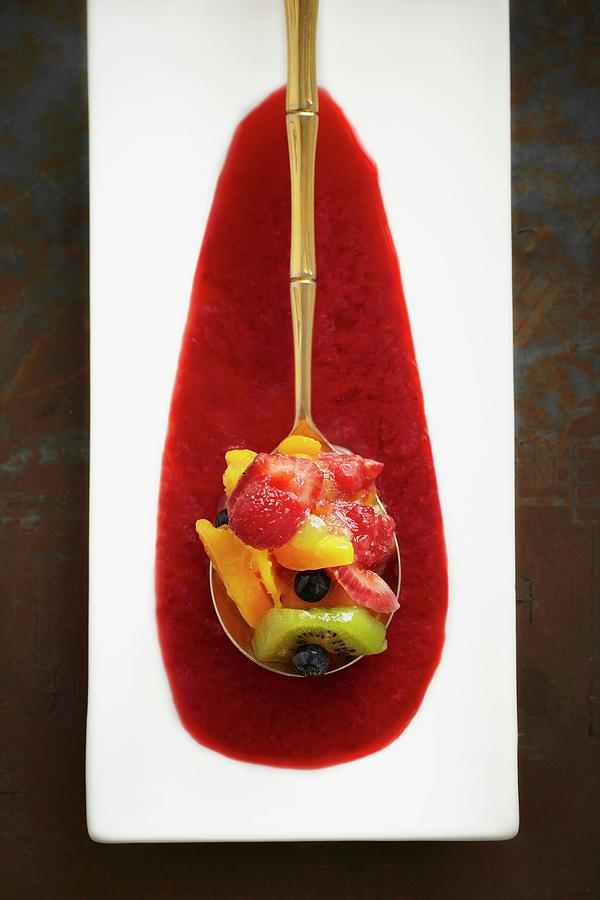 Fruit Salad Served On A Golden Spoon In A Pool Of Sauce seen From Above Photograph by Tim Atkins Photography