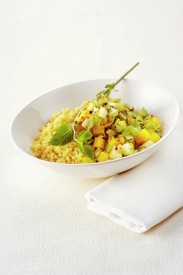 Fruit Salad With Couscous And Peppermint Photograph by Franco Pizzochero